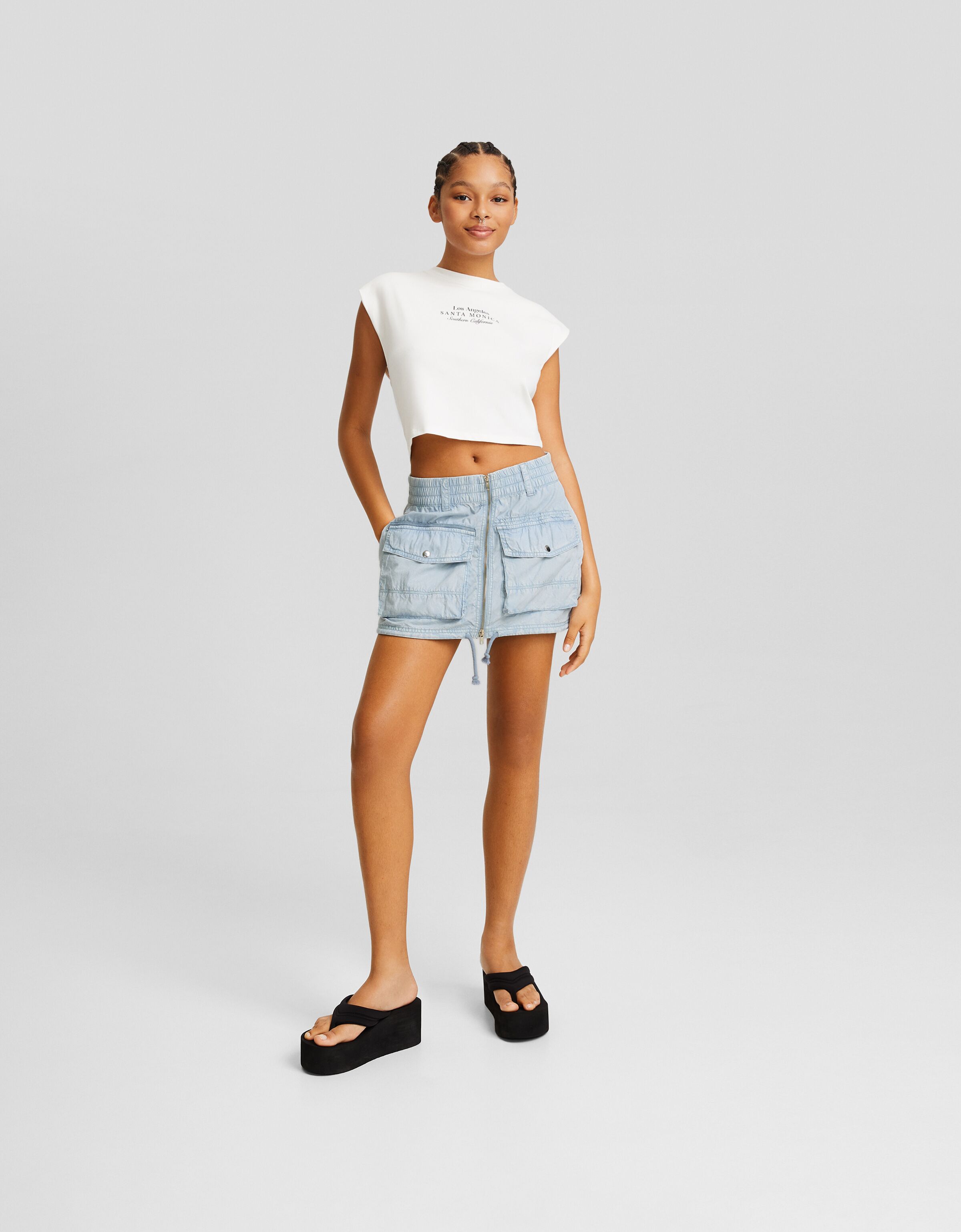 Falda denim mini cargo efecto lavado