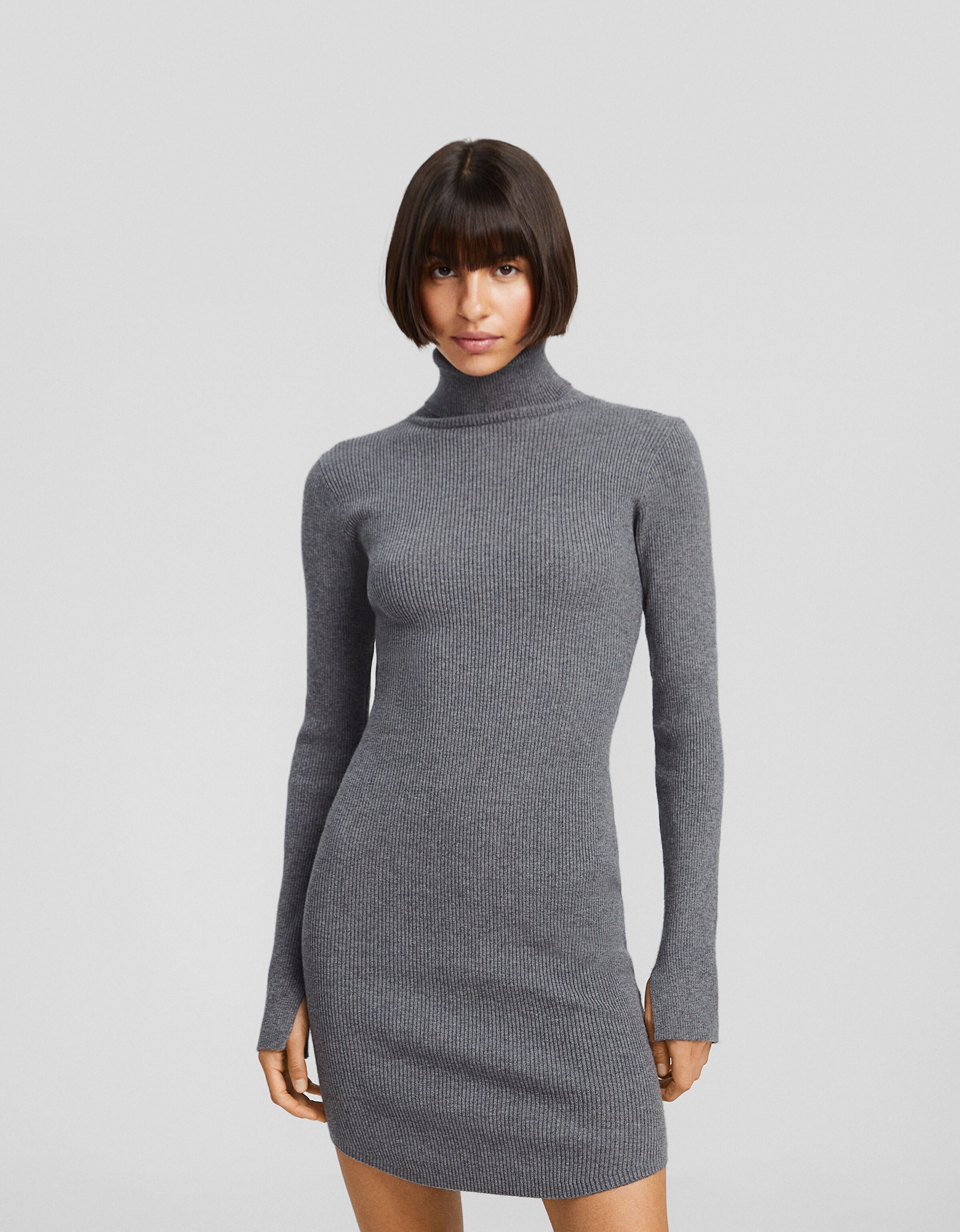 Vestido mini manga larga cuello subido punto