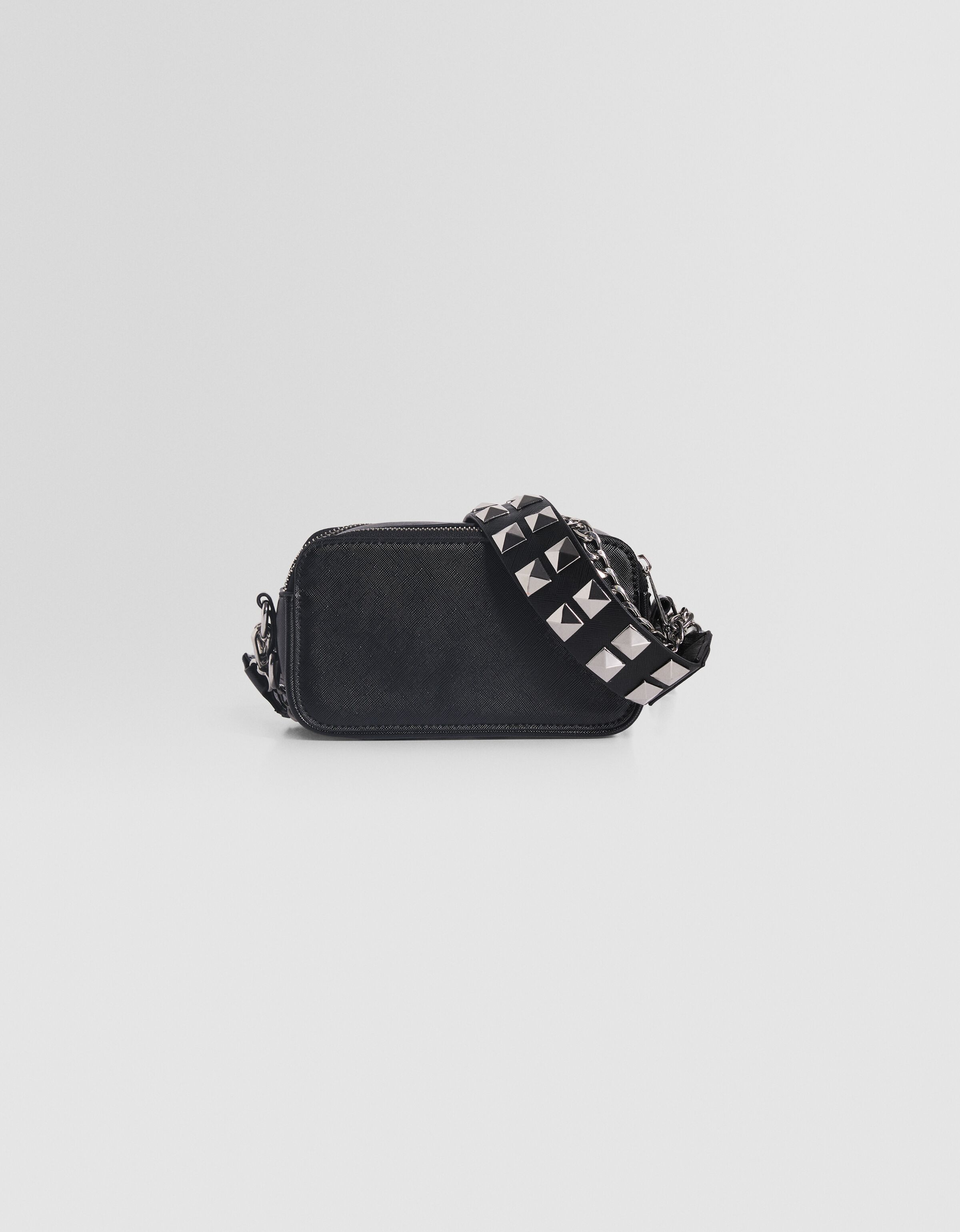 Bolso bandolera multiposición tachas