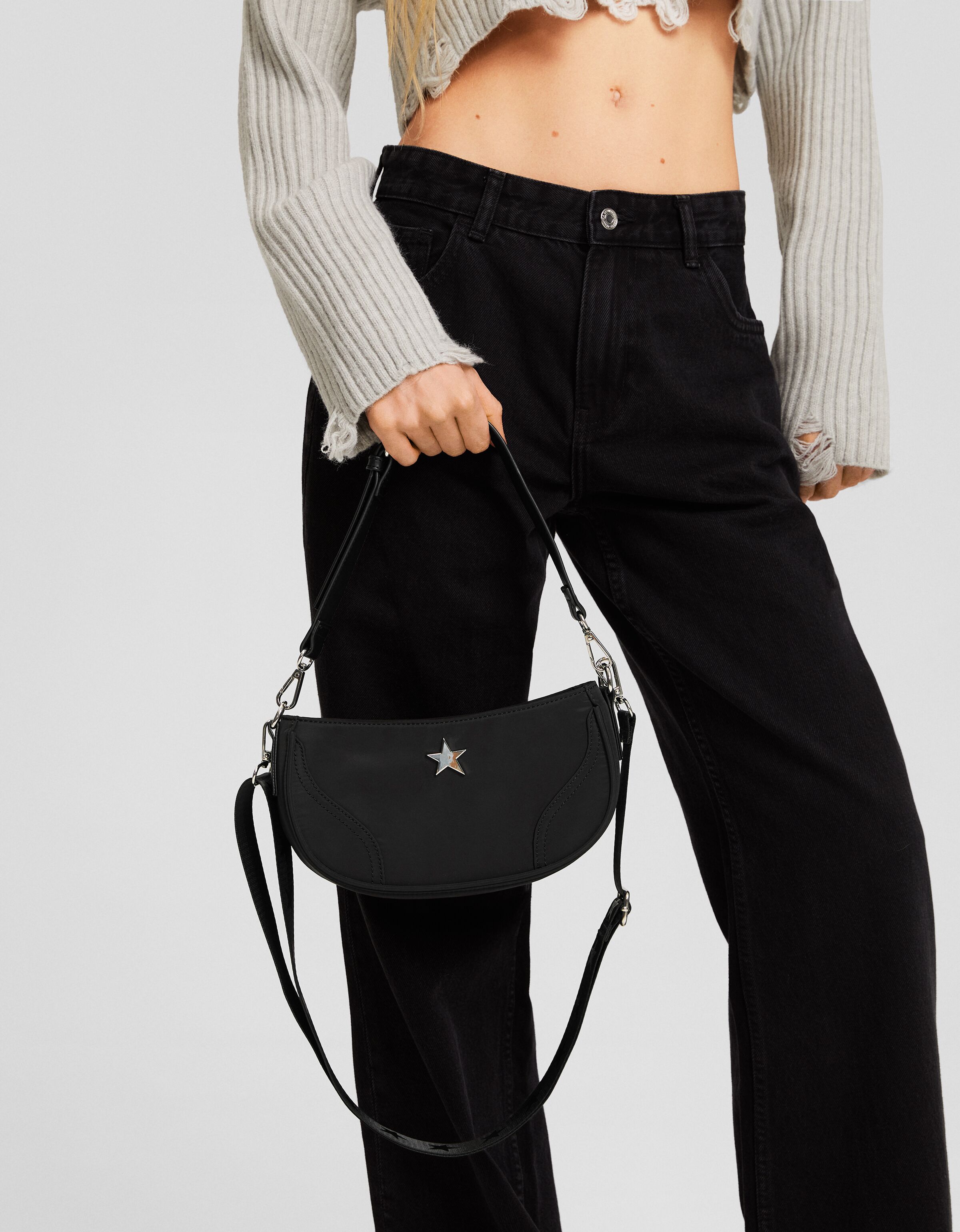 Bolso bandolera multiposición detalle