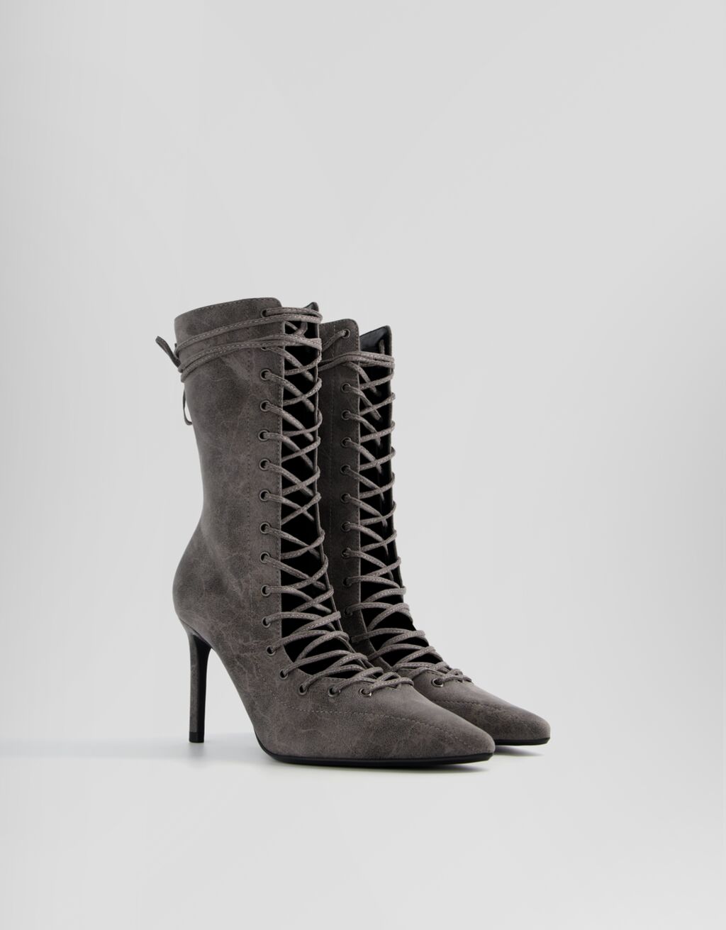 Botines tacón fino acordonados con cremallera
