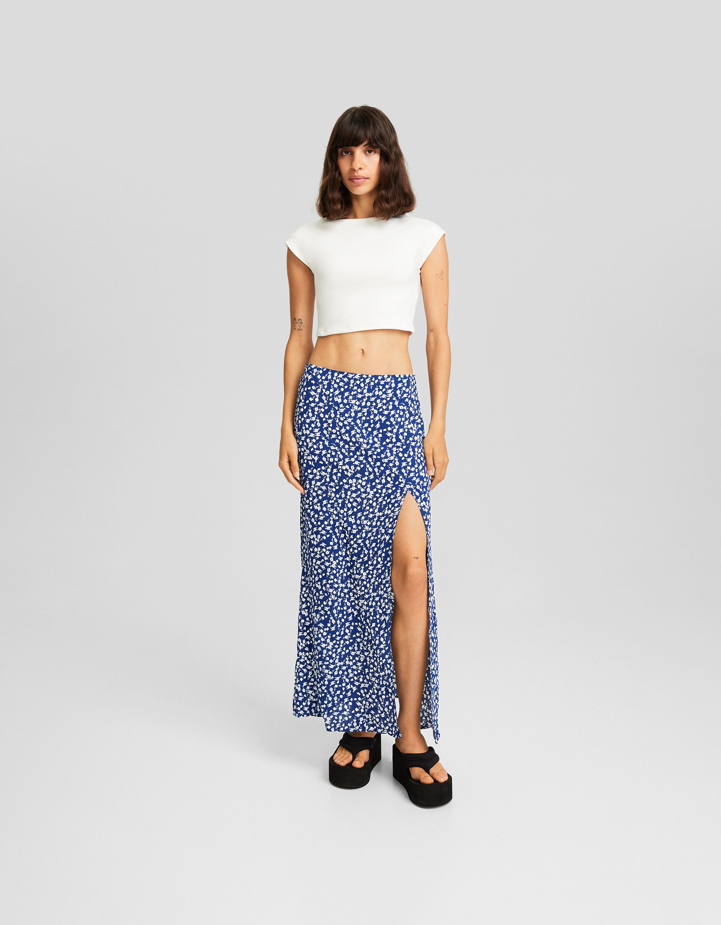 Falda midi print floral abertura