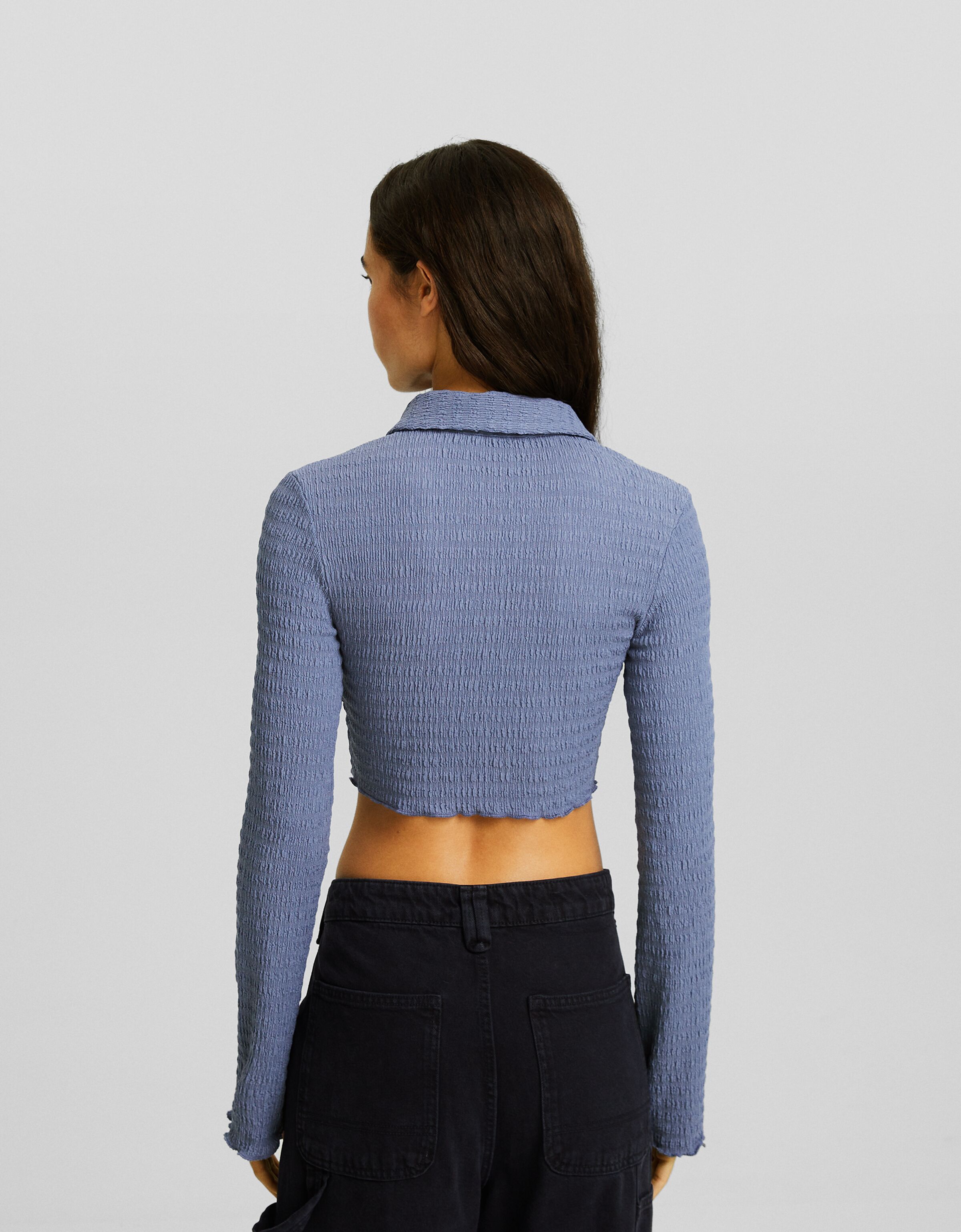 Camisa manga larga regular fit detalle picos