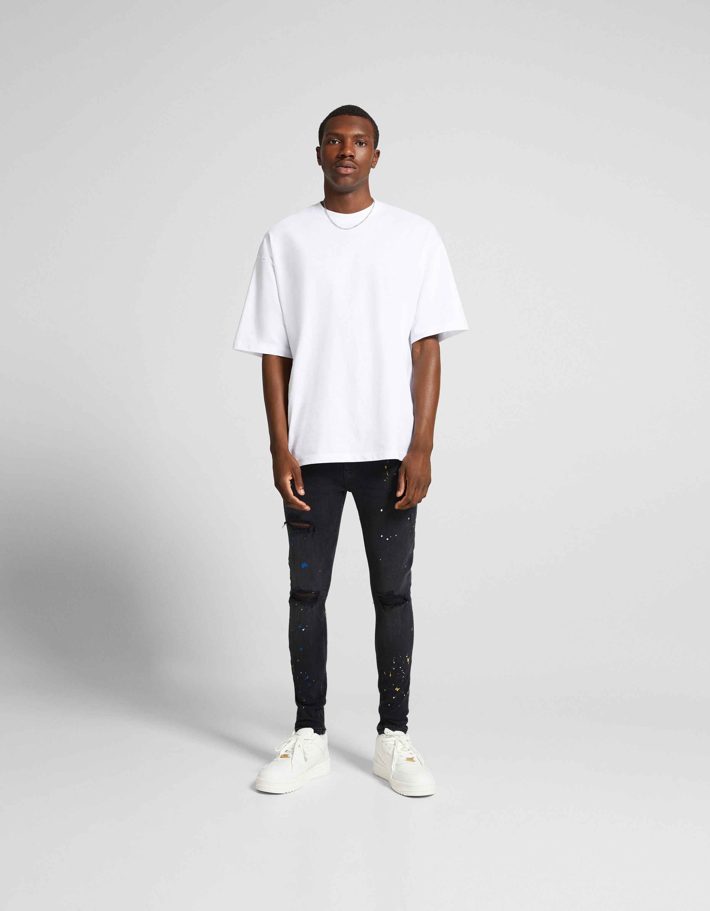 Jeans super skinny rotos pintura