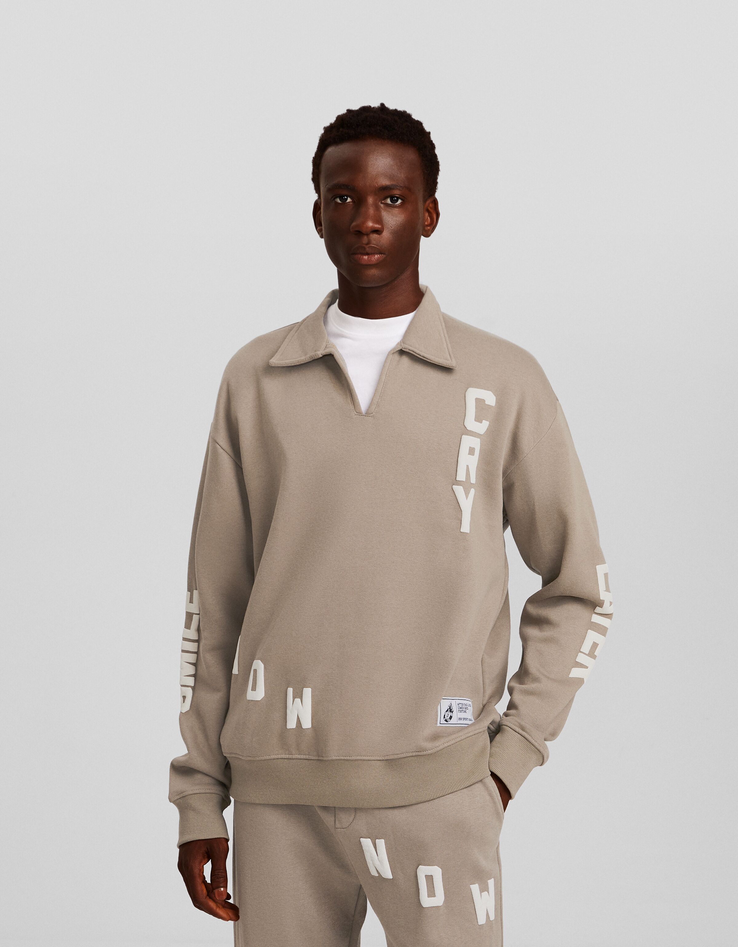 Sudadera cuello polo print