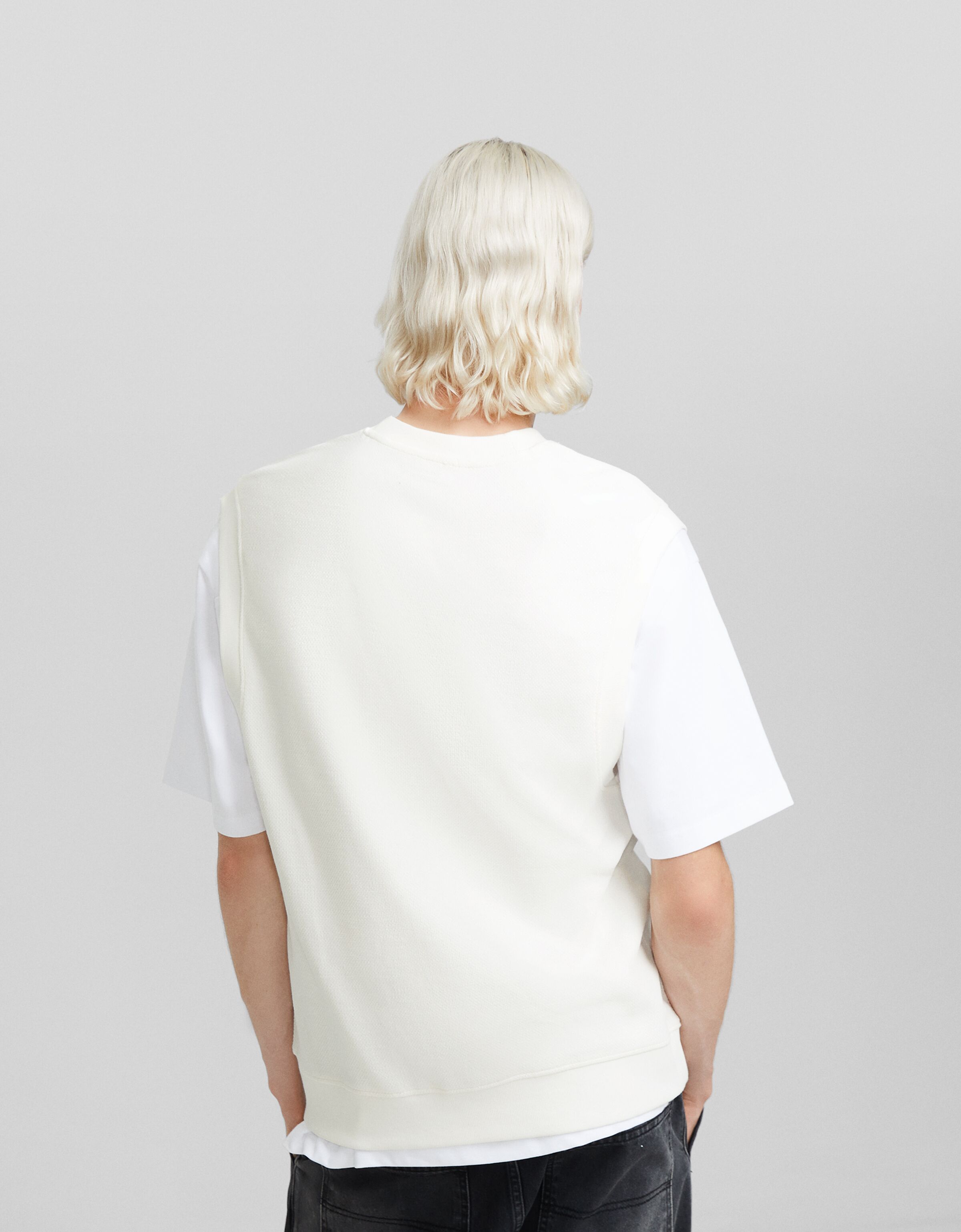 Chaleco cuello pico punto