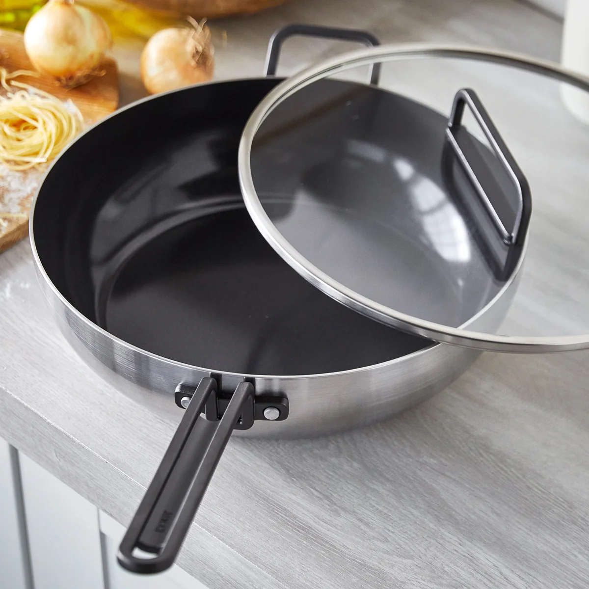 Stanley Tucci™ Stainless Steel Ceramic Nonstick 6.5-Quart Essential Stanley Pan with Lid | Black Handle