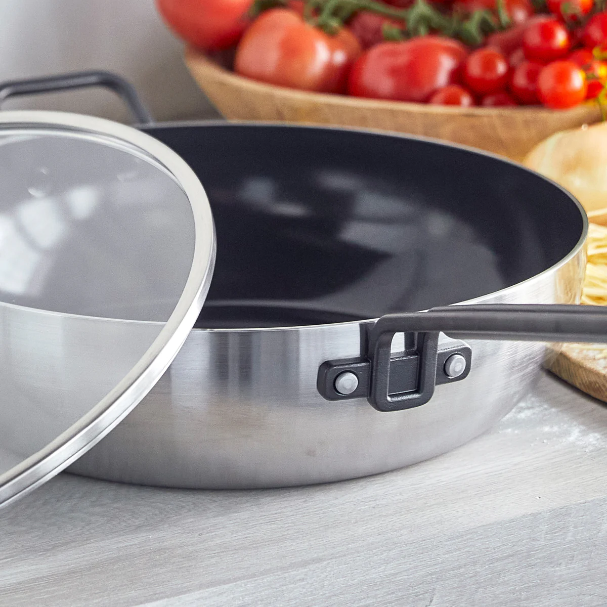 Stanley Tucci™ Stainless Steel Ceramic Nonstick 6.5-Quart Essential Stanley Pan with Lid | Black Handle