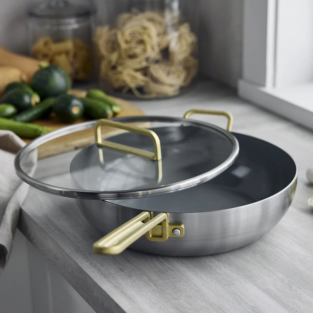 Stanley Tucci™ Stainless Steel Ceramic Nonstick 6.5-Quart Essential Stanley Pan with Lid | Champagne Handle