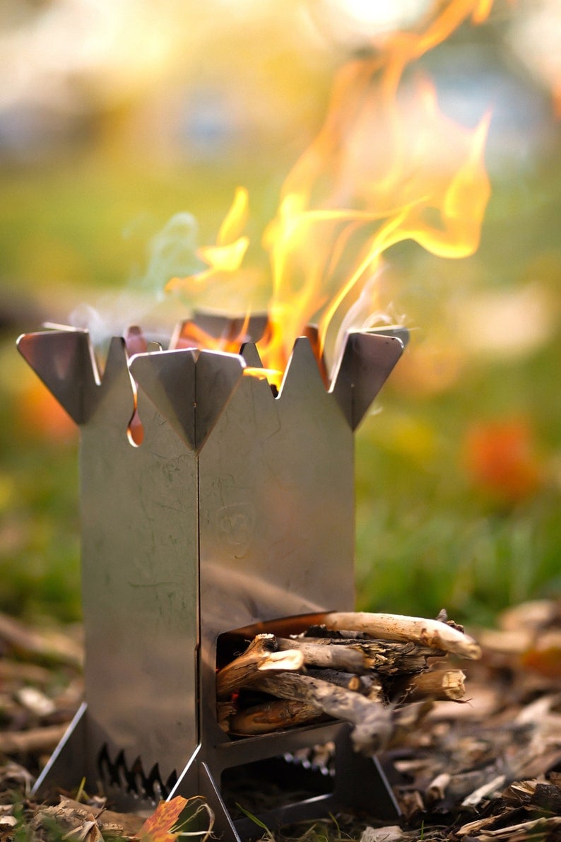 Compact flat-pack wood stove for camping