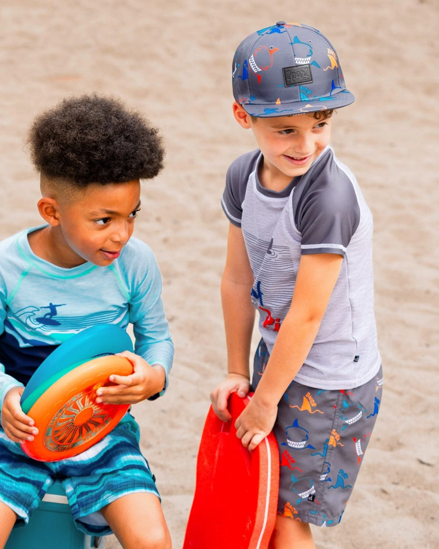 Printed Boardshorts Orange, Red, And Blue Sharks On Gray