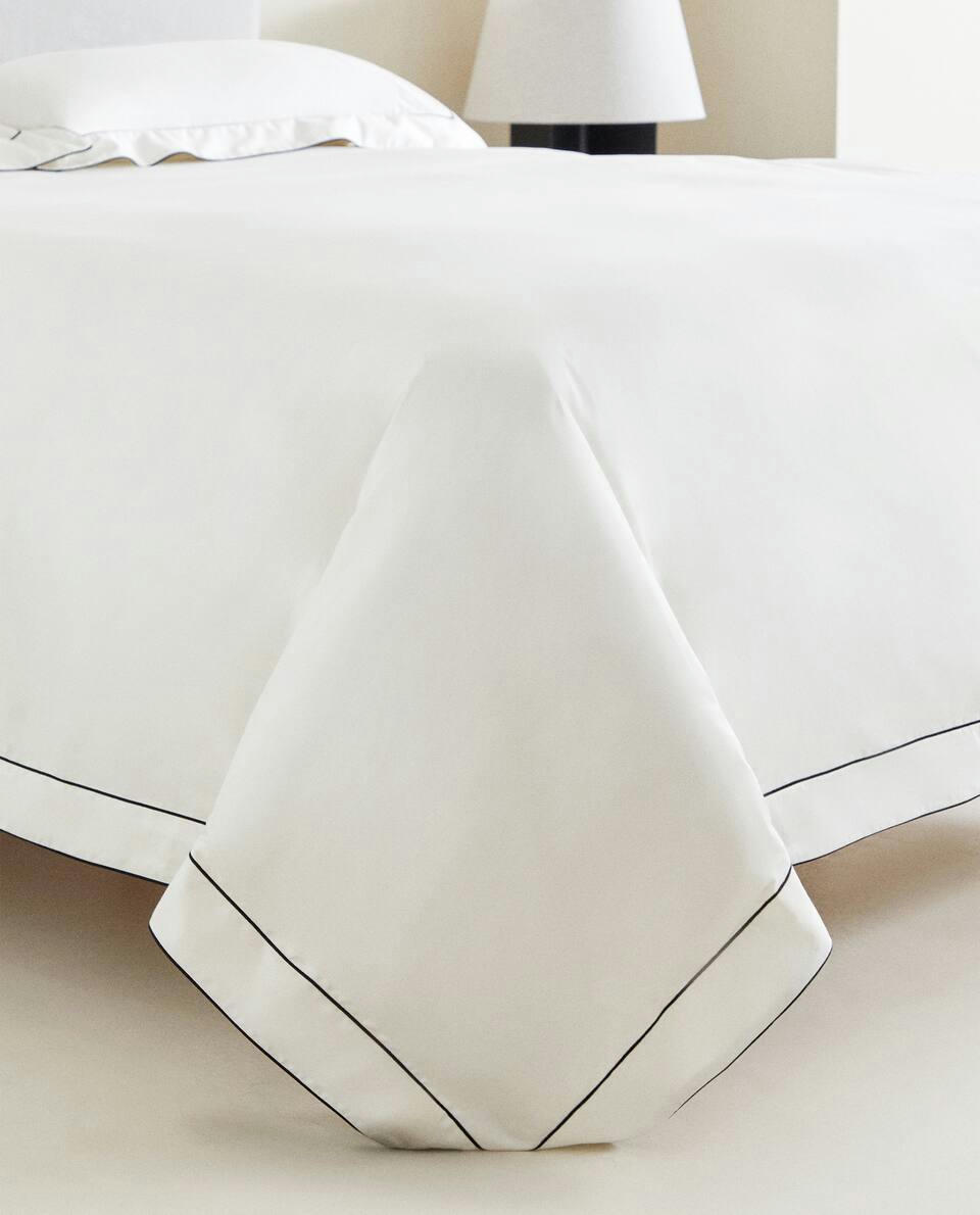 DUVET COVER WITH COLOURED DOUBLE PIPING DETAIL