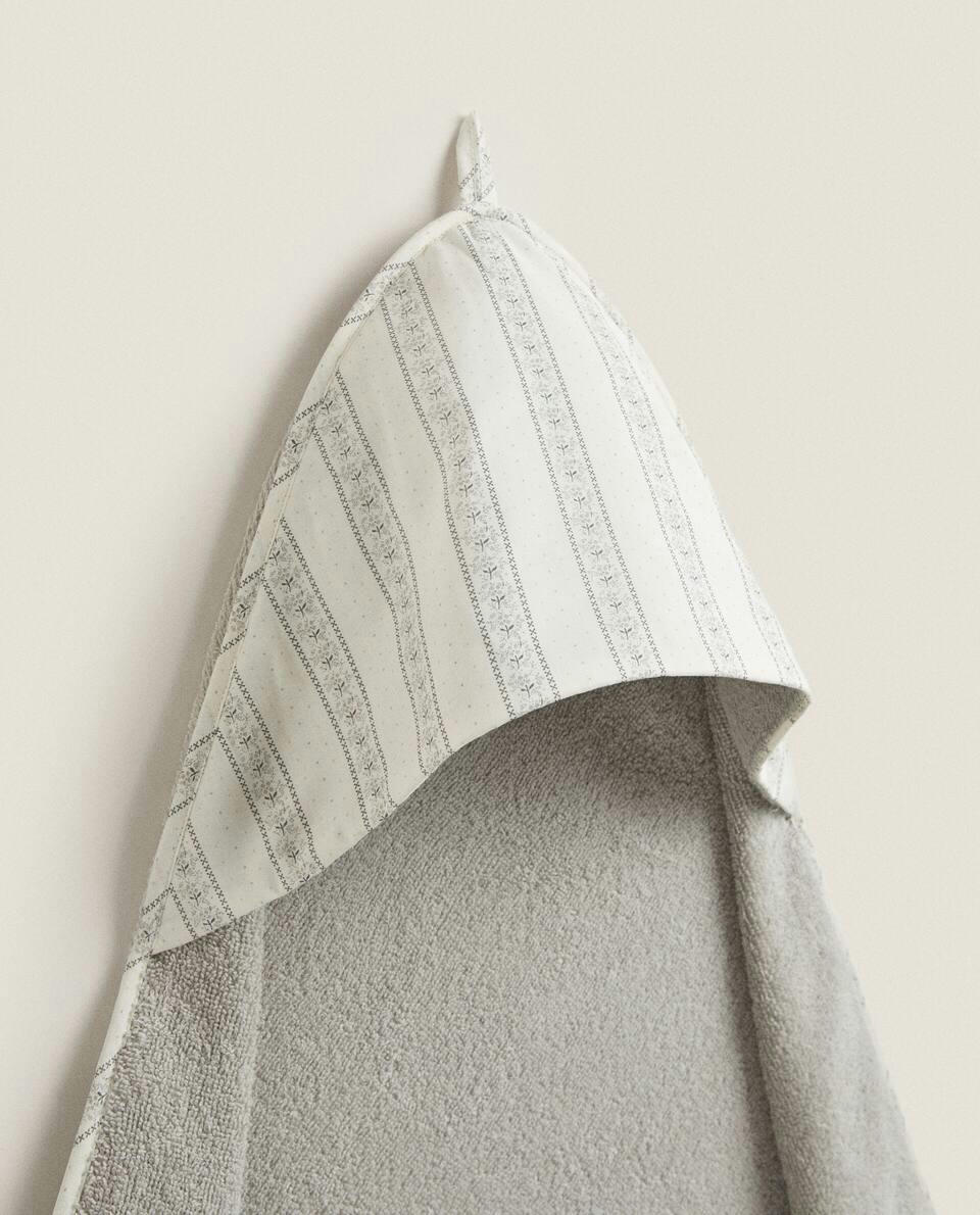 BABY CAPE WITH FLORAL BORDER