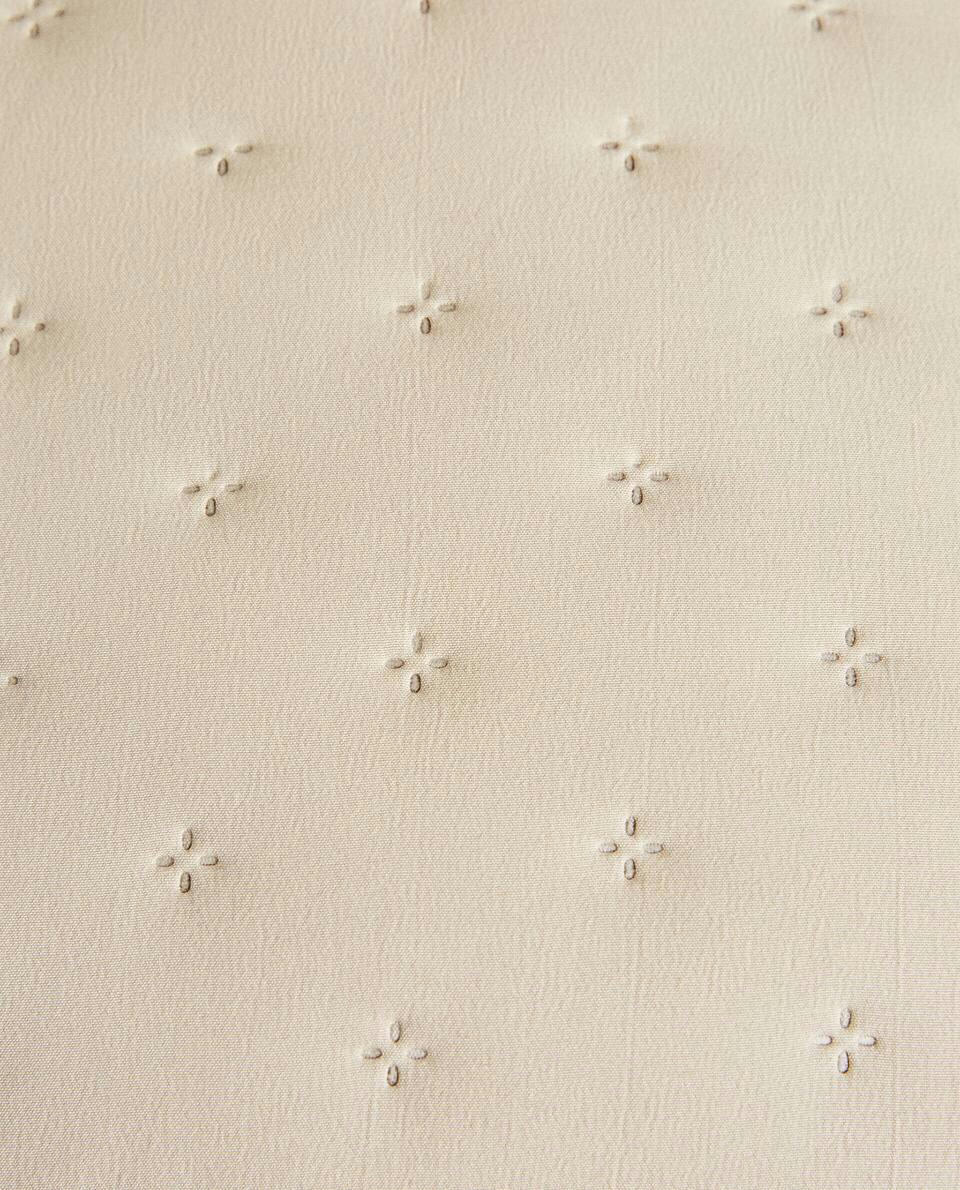 QUILTED DOTTED CUSHION COVER