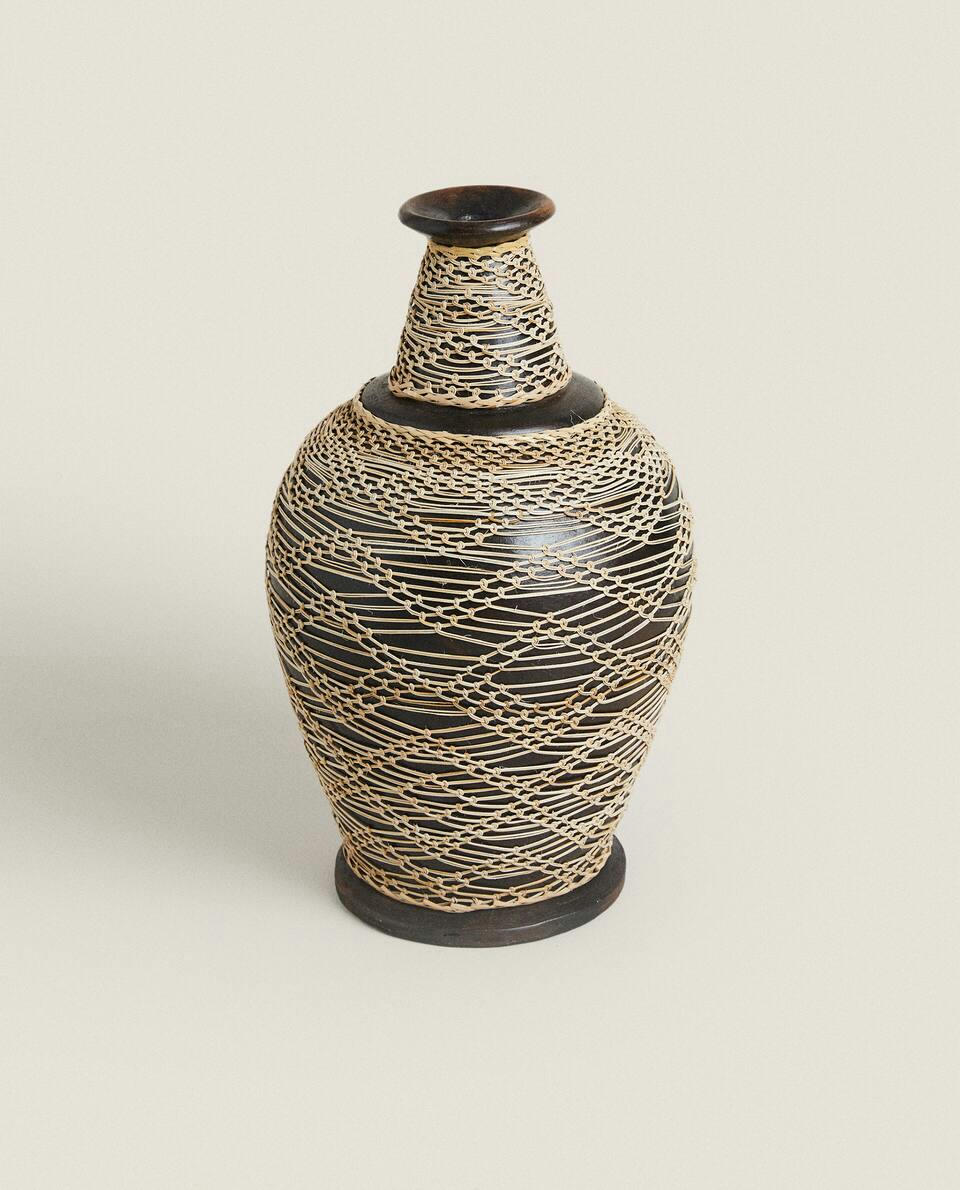 TERRACOTTA AND RATTAN VASE