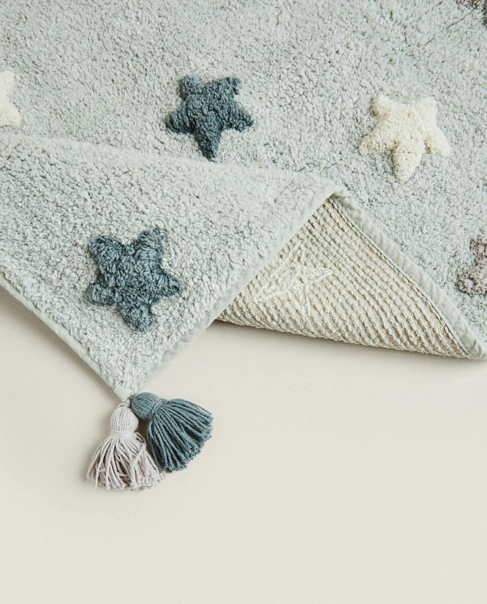 CHILDREN'S BATH MAT WITH POM-POM STARS