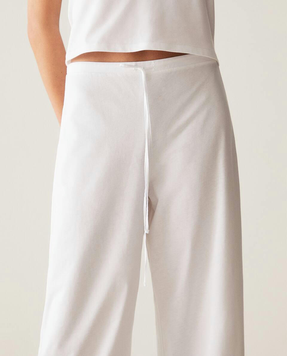 CROPPED TROUSERS WITH LACE TRIM