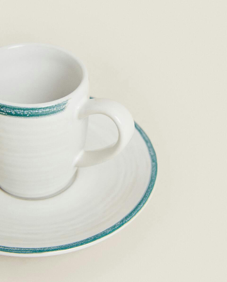 RIMMED COFFEE CUP