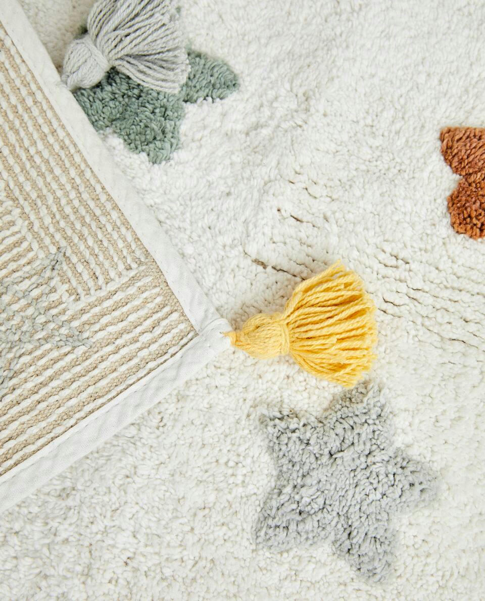 CHILDREN'S BATH MAT WITH POM-POM STARS