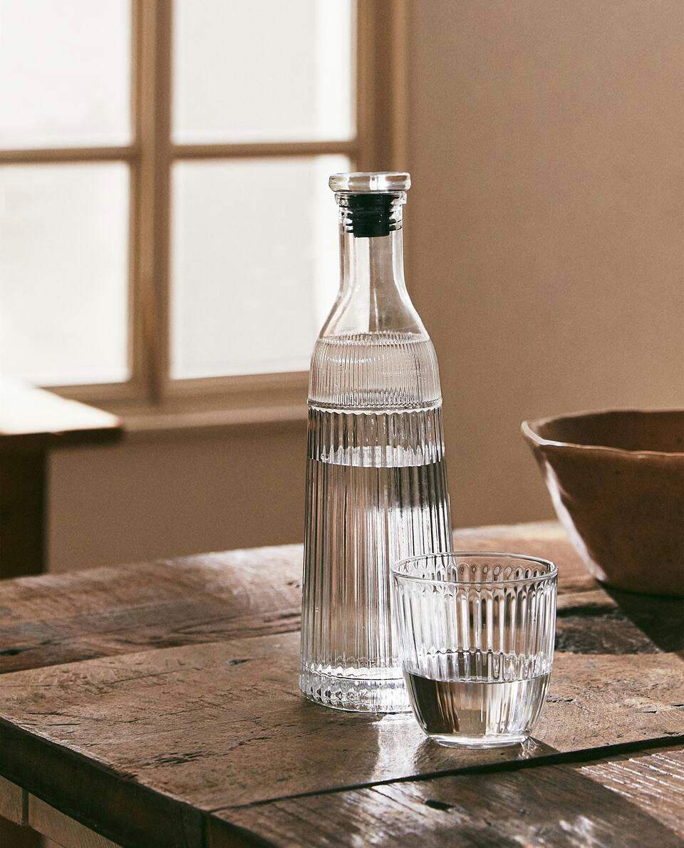 FACETED GLASS BOTTLE