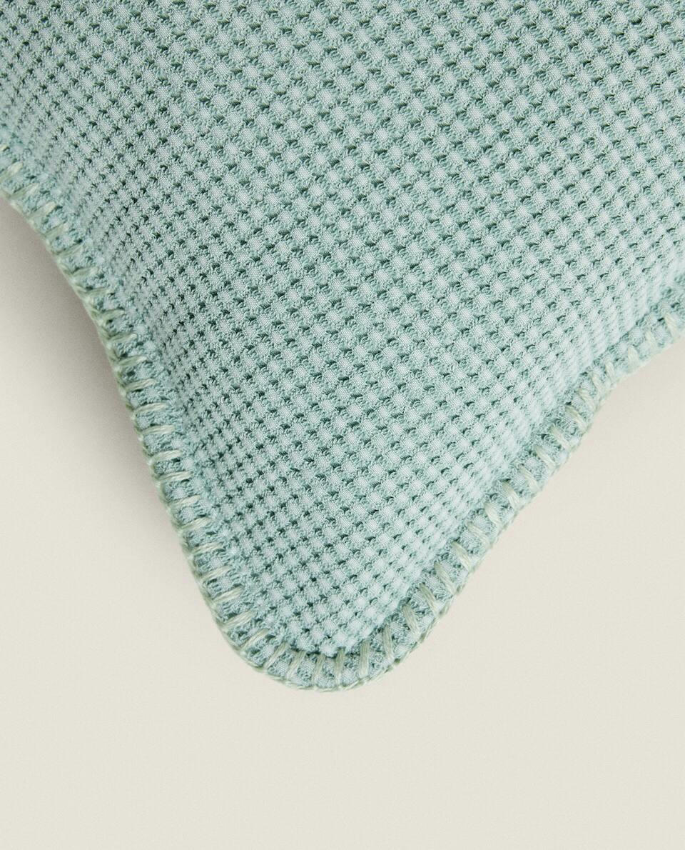 TEXTURED WAFFLE-KNIT CUSHION COVER
