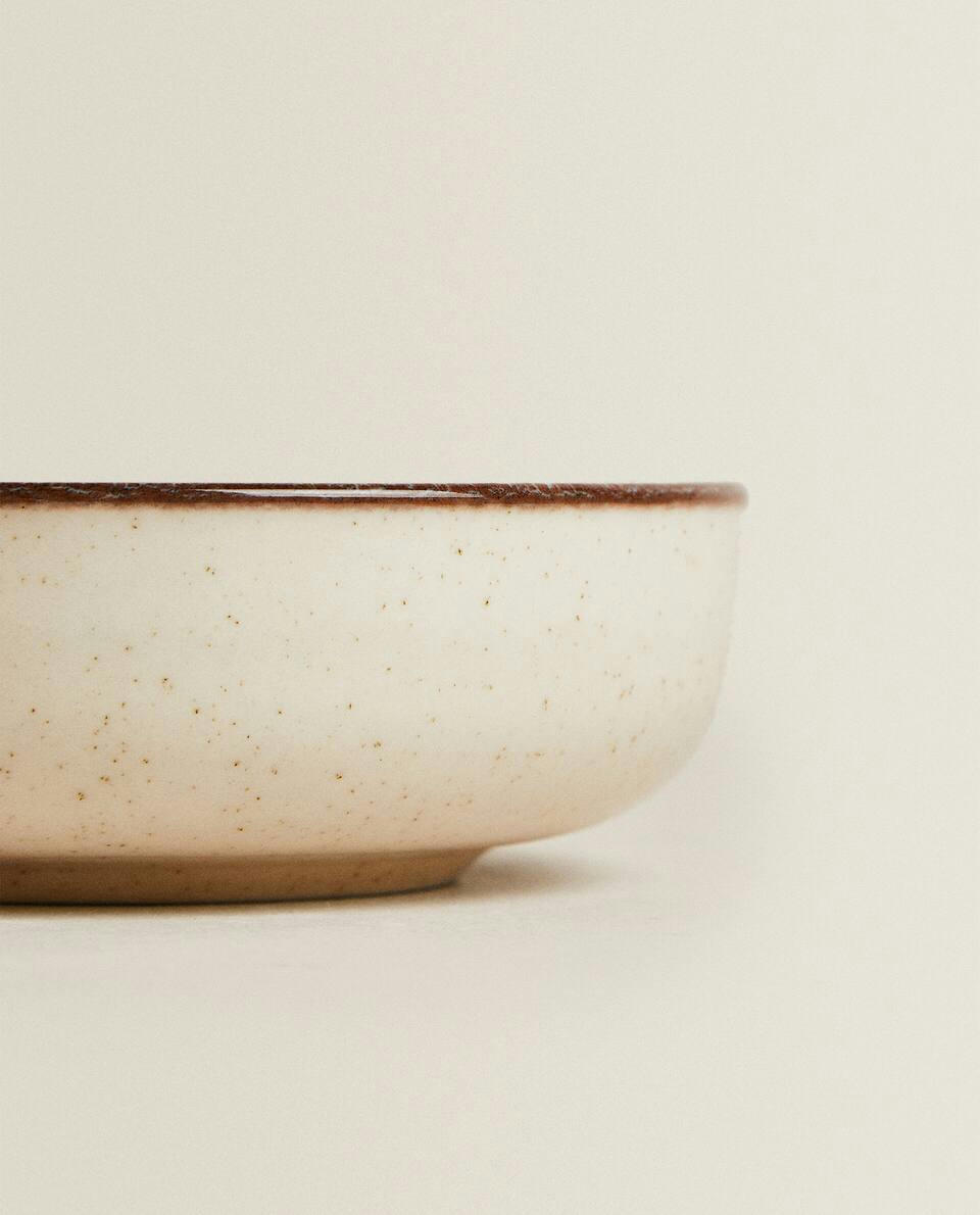 PORCELAIN BOWL WITH ANTIQUE FINISH RIM