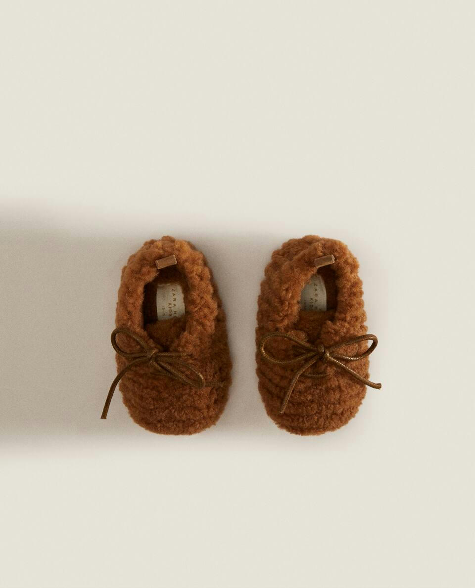 FAUX SHEARLING BOOTIES WITH BOW