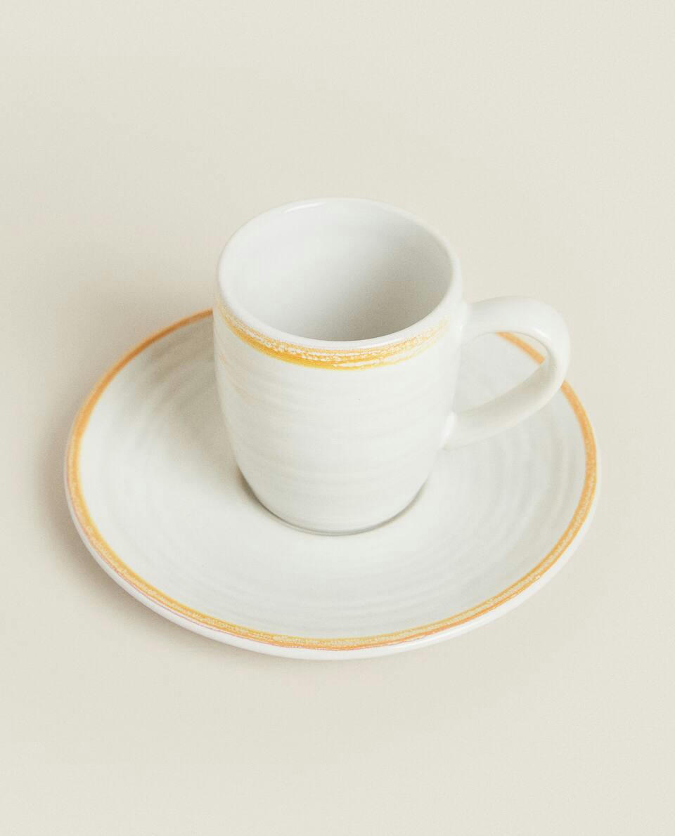 RIMMED COFFEE CUP