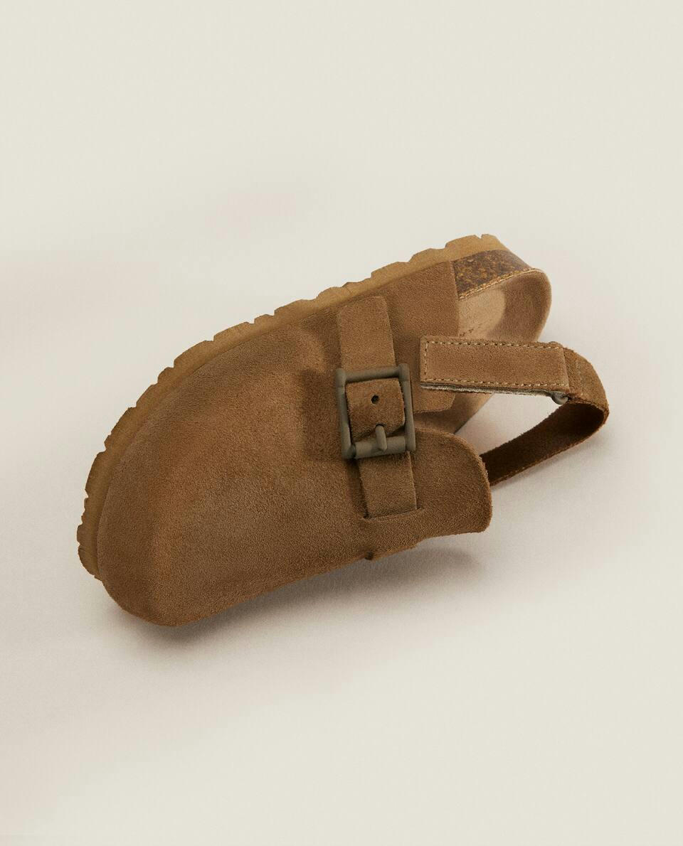BUCKLED LEATHER CLOGS