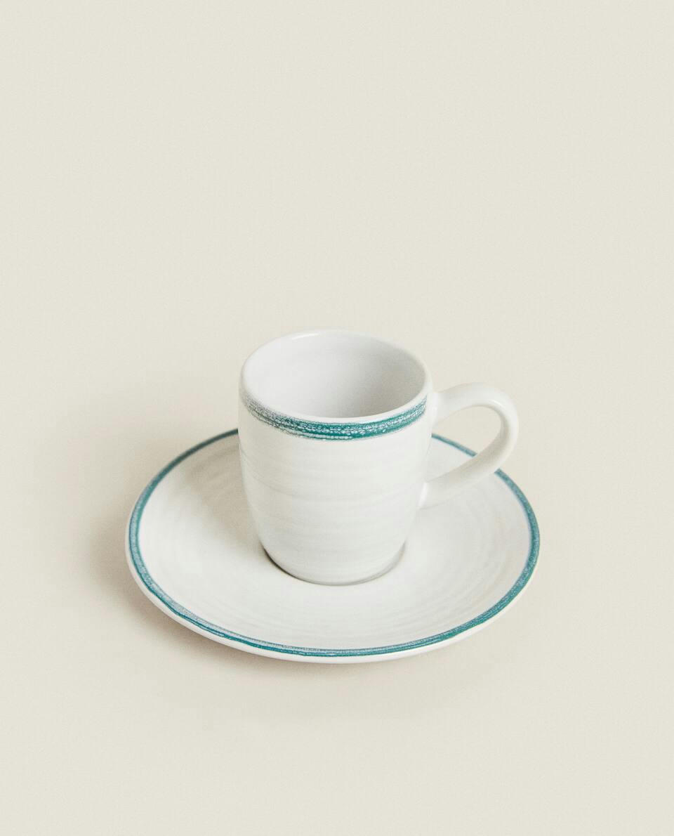 RIMMED COFFEE CUP