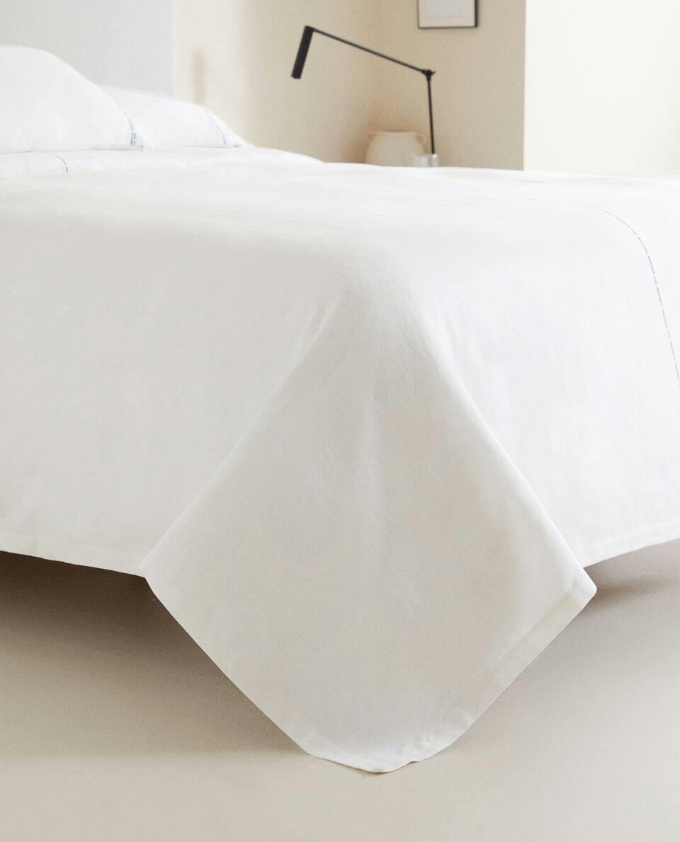 BEDSPREAD WITH TOPSTITCHING