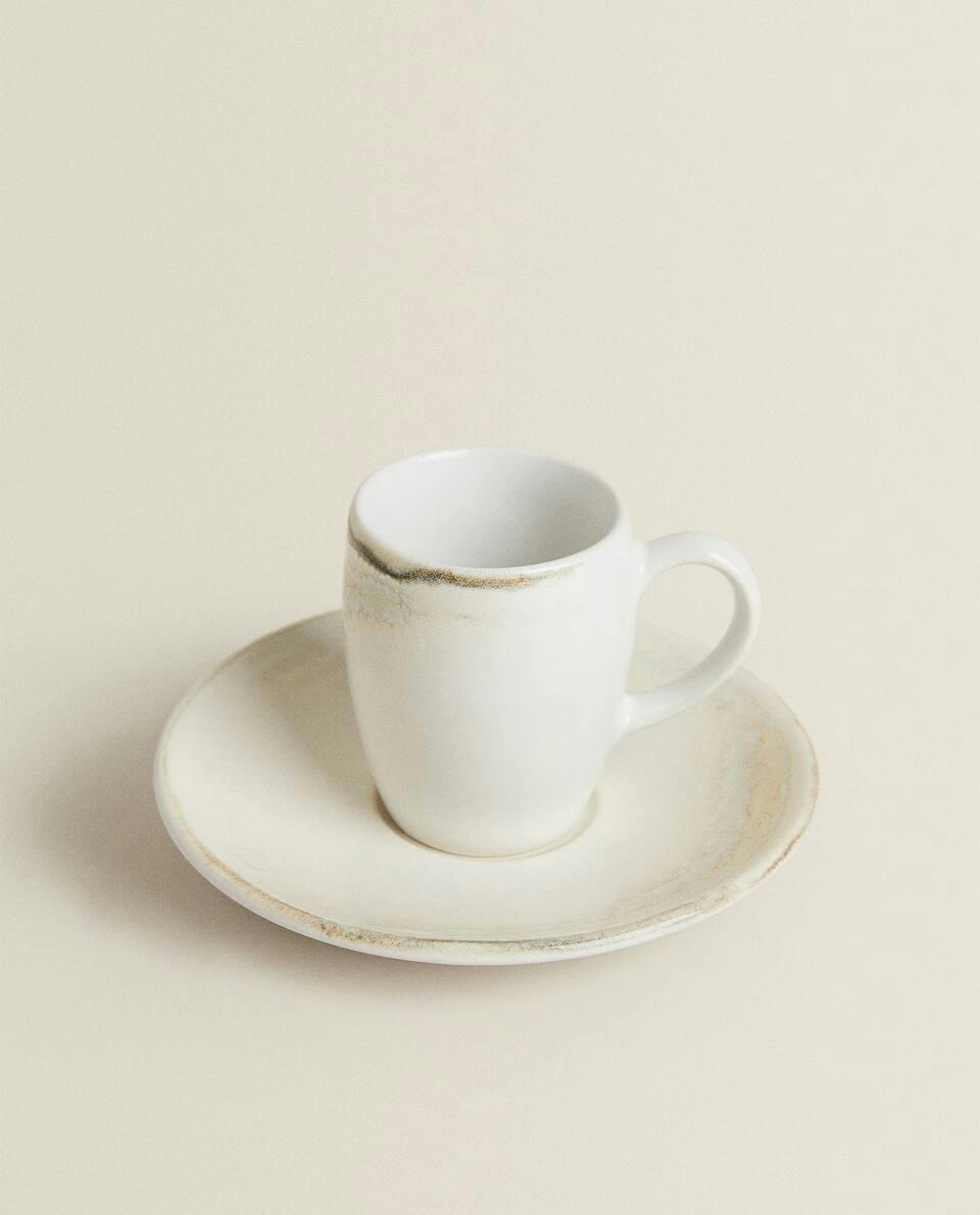 STONEWARE COFFEE CUP AND SAUCER