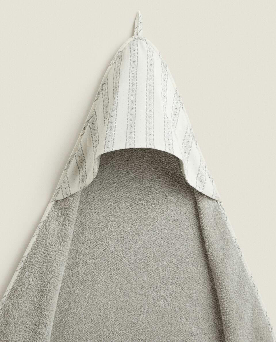 BABY CAPE WITH FLORAL BORDER