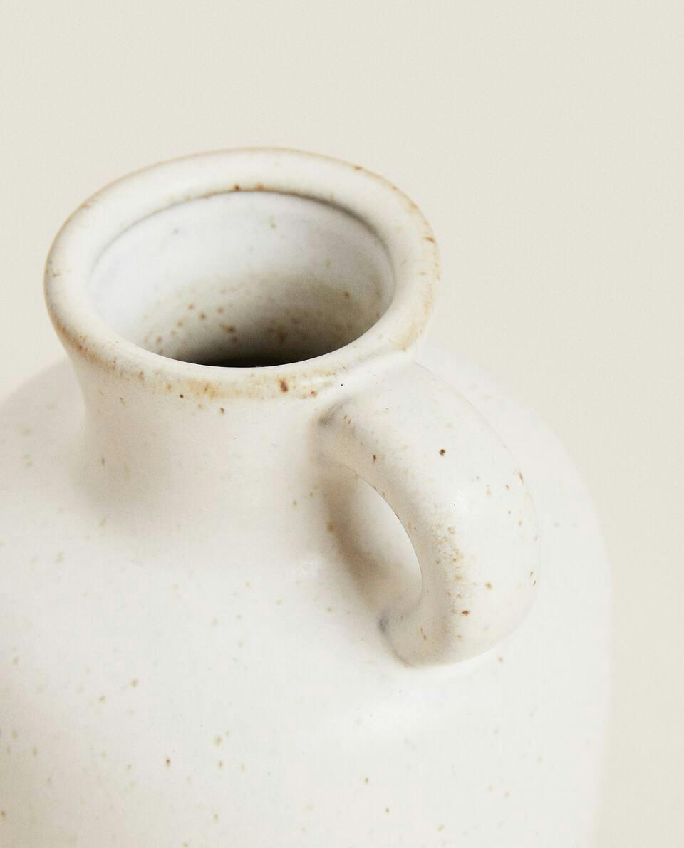 VASE WITH RAISED DESIGN