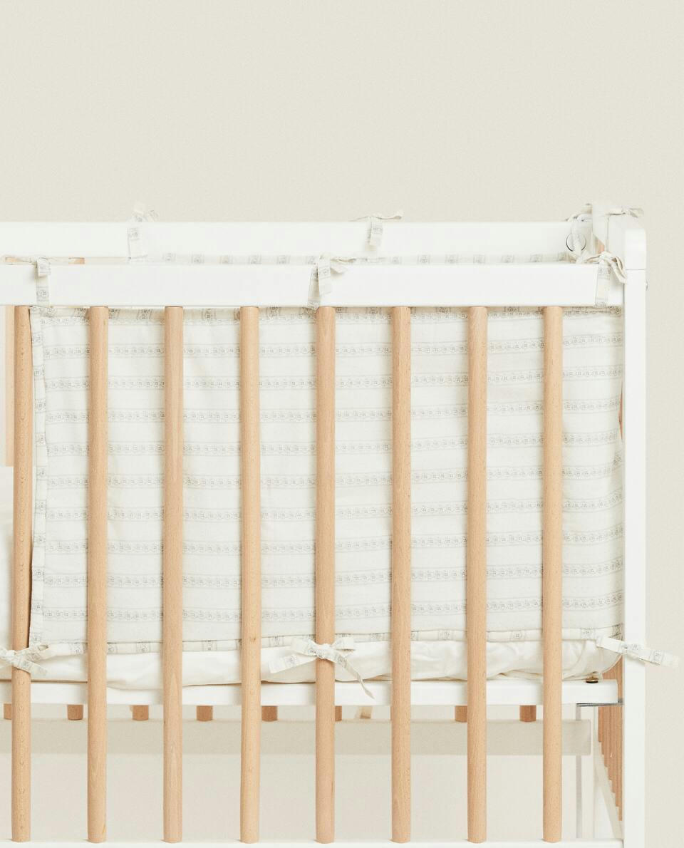 FLORAL BORDER COT BUMPER