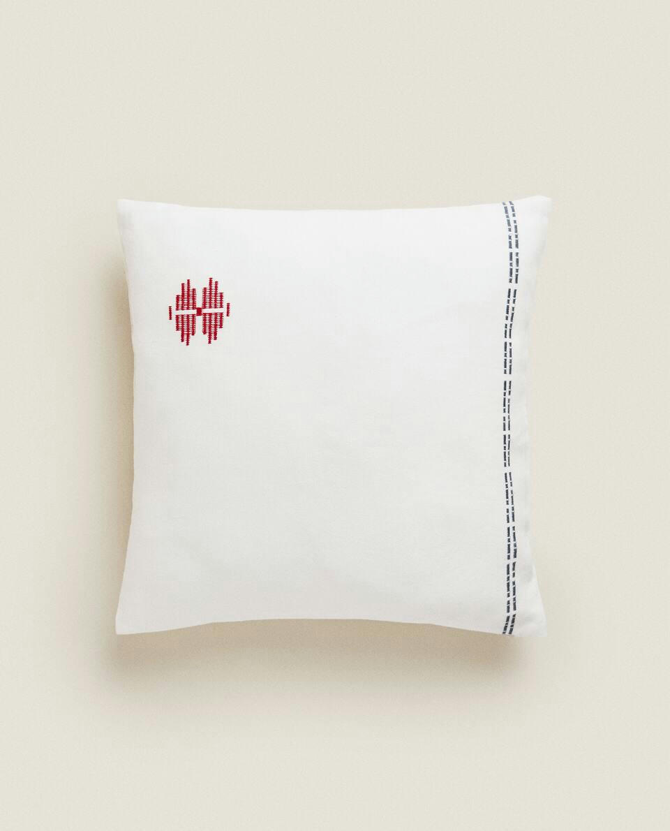 EMBROIDERED CUSHION COVER