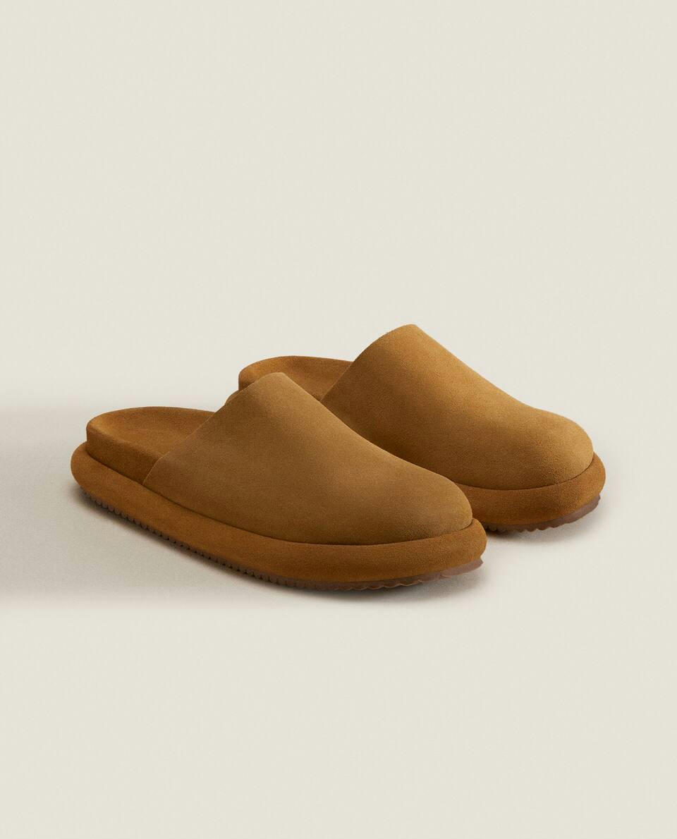 LEATHER MULE SLIPPERS WITH SOLE DETAIL