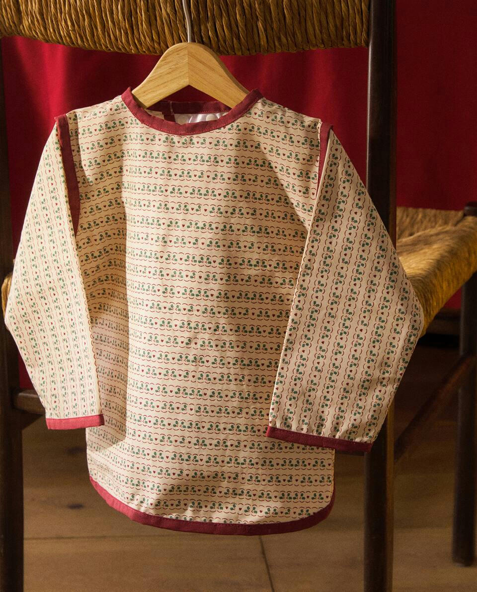 CHRISTMAS CHILDREN’S BIB WITH SLEEVES