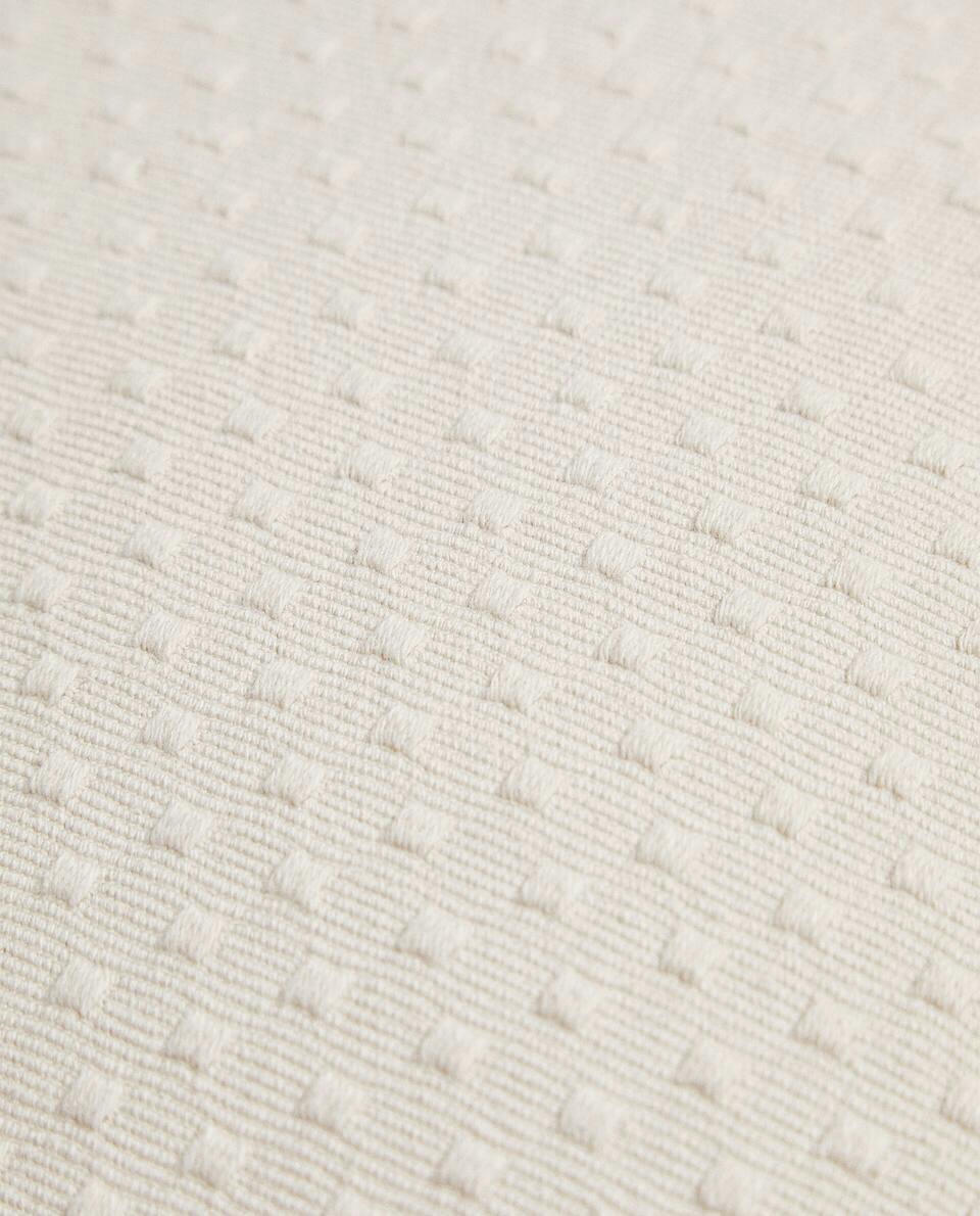 CUSHION COVER WITH POLKA DOT DESIGN