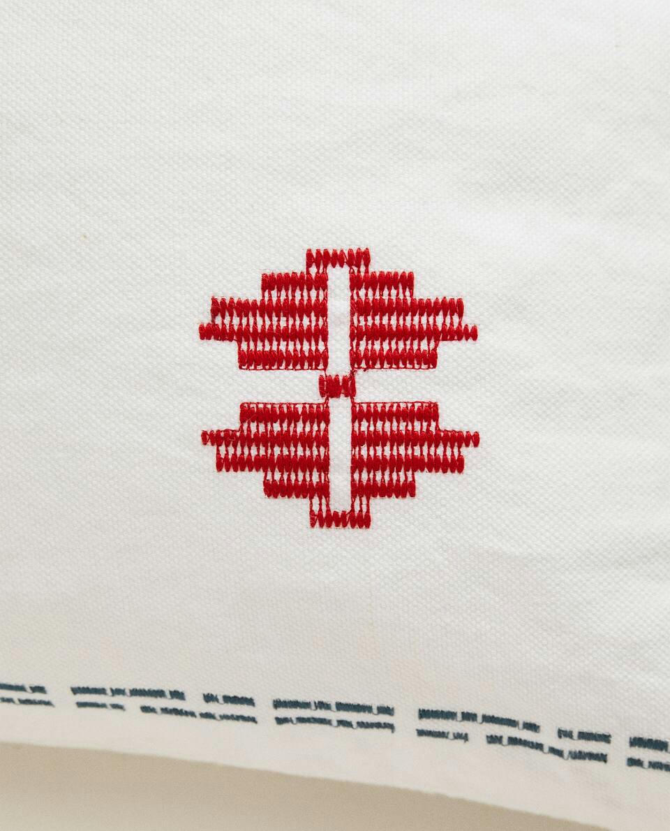 EMBROIDERED CUSHION COVER