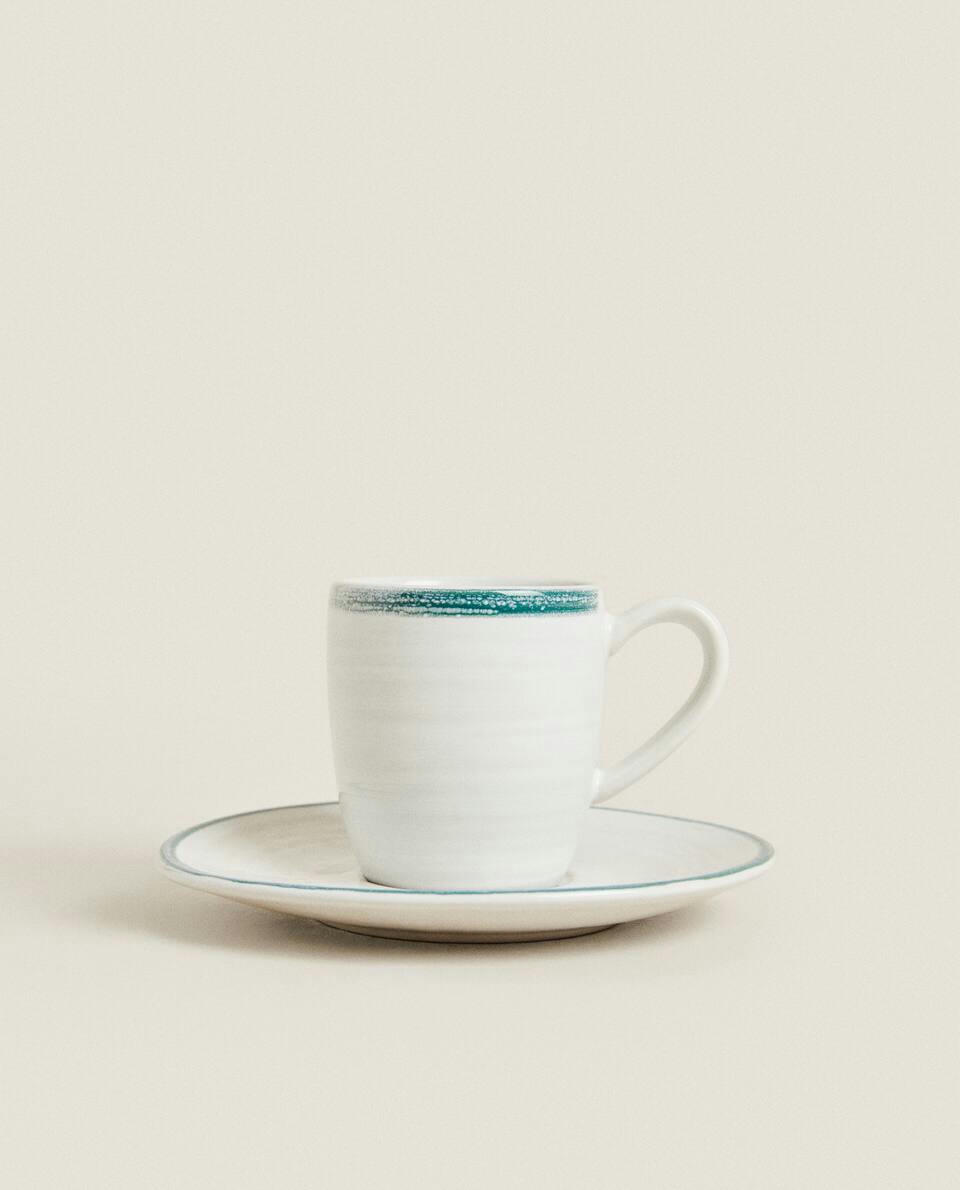 RIMMED COFFEE CUP
