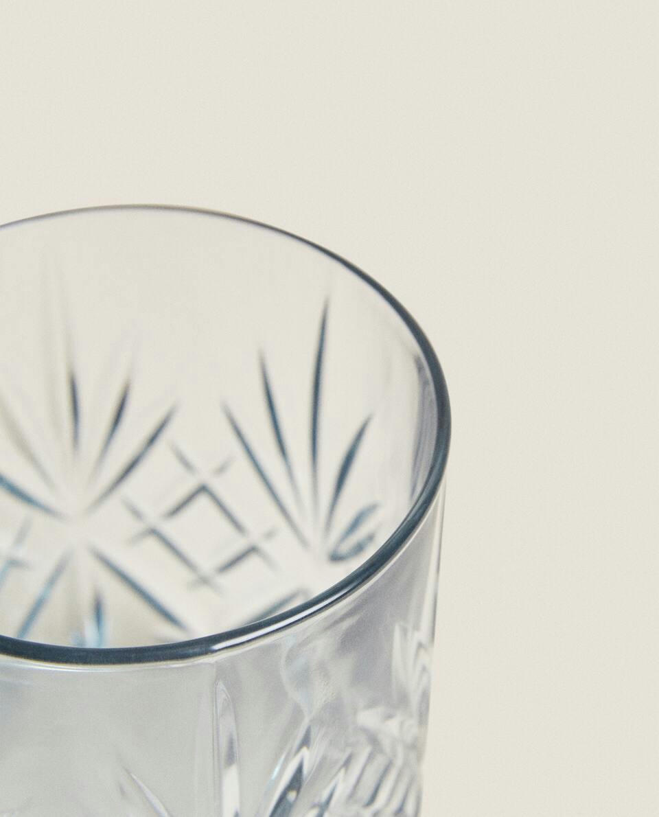 CRYSTALLINE TUMBLER WITH RAISED DESIGN