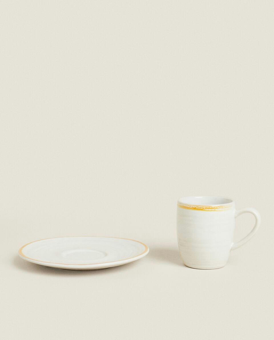 RIMMED COFFEE CUP