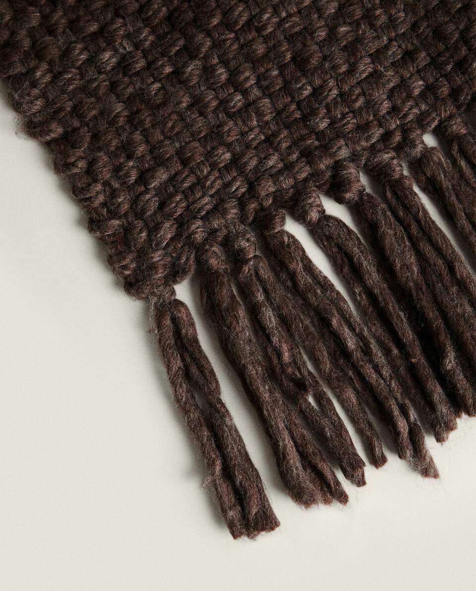 FRINGED KNIT BLANKET