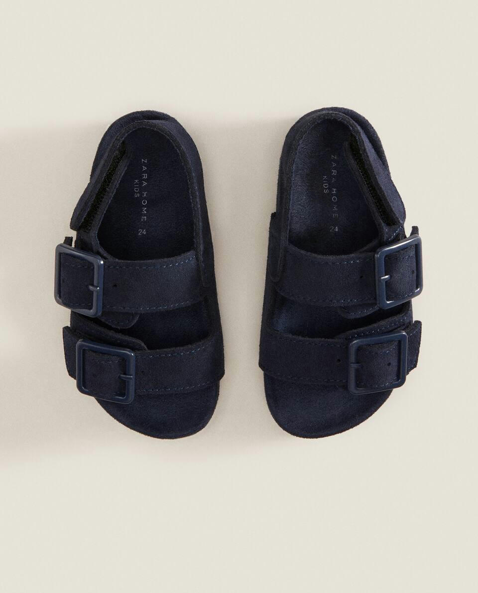 BUCKLED LEATHER SANDALS