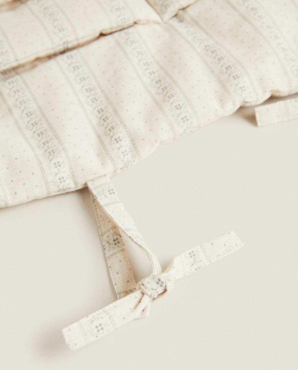 MUSLIN ORGANISER WITH BORDER