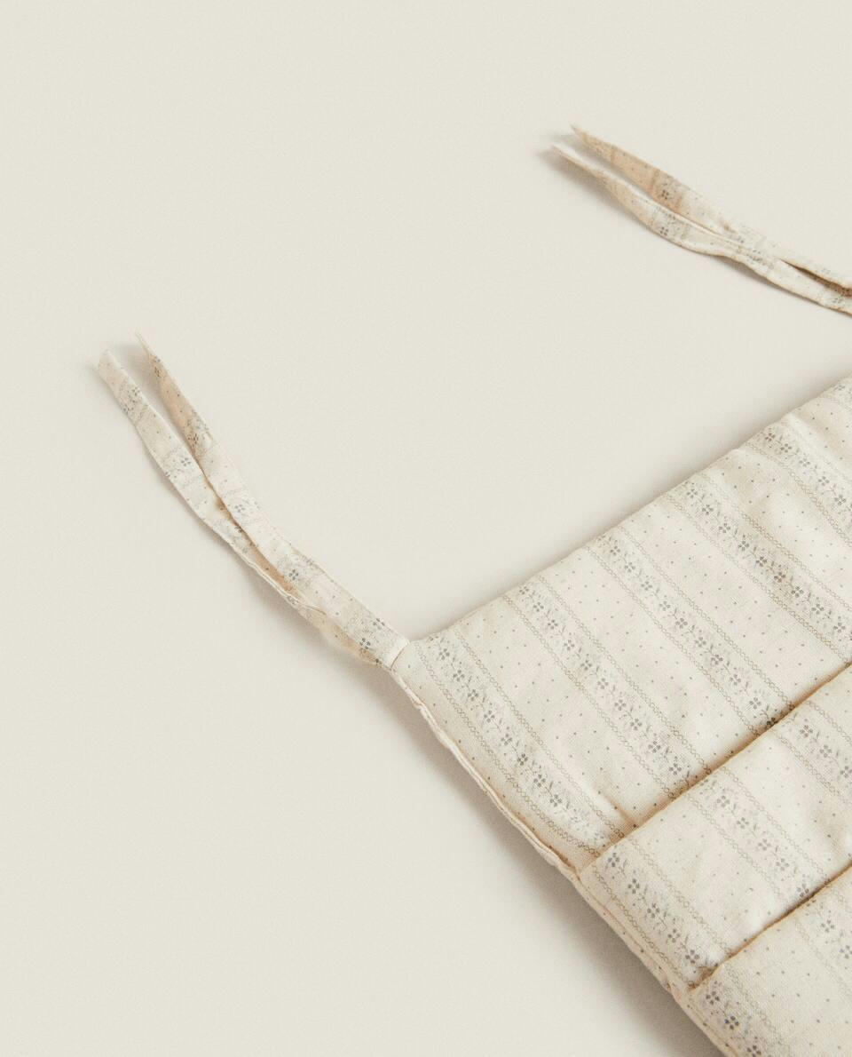 MUSLIN ORGANISER WITH BORDER