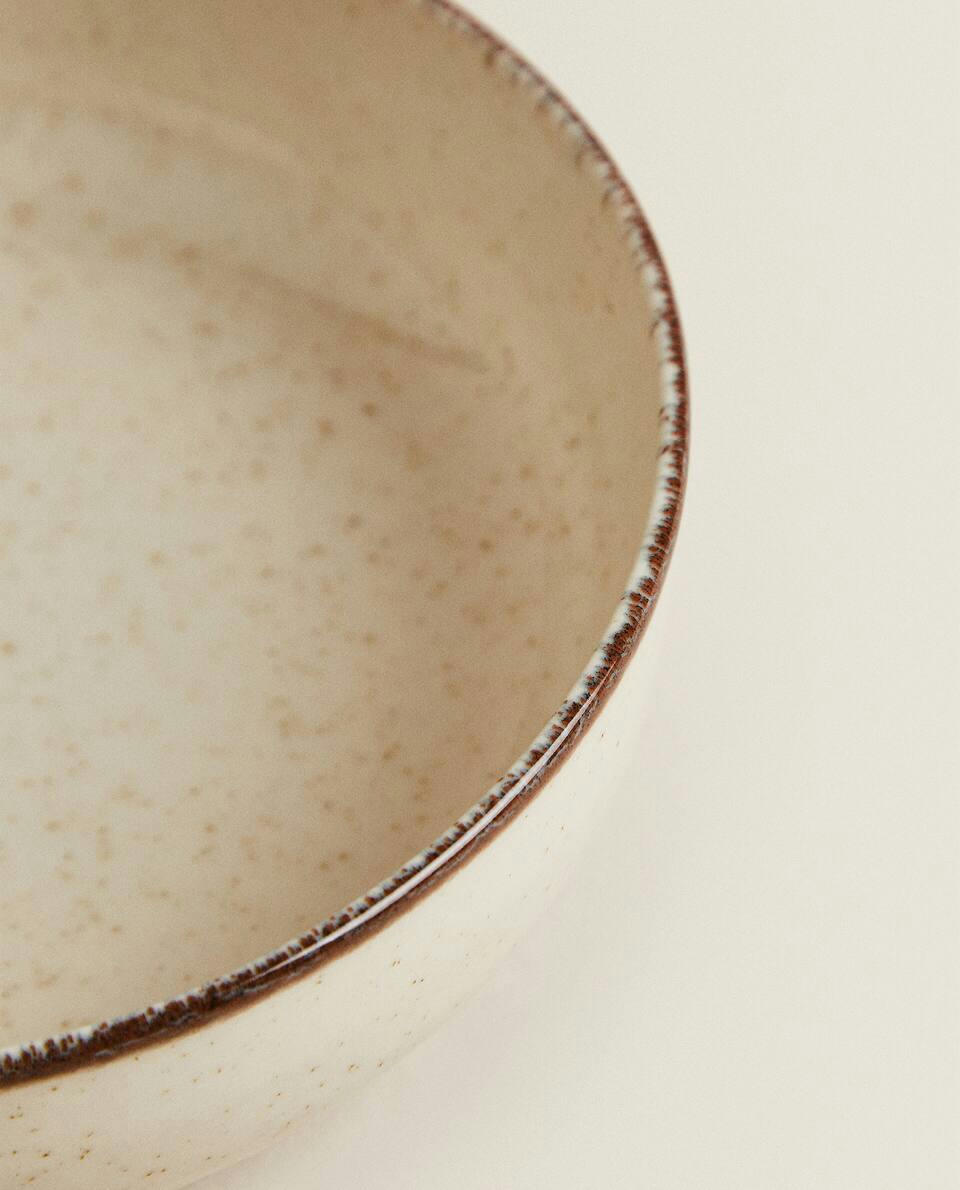 PORCELAIN BOWL WITH ANTIQUE FINISH RIM