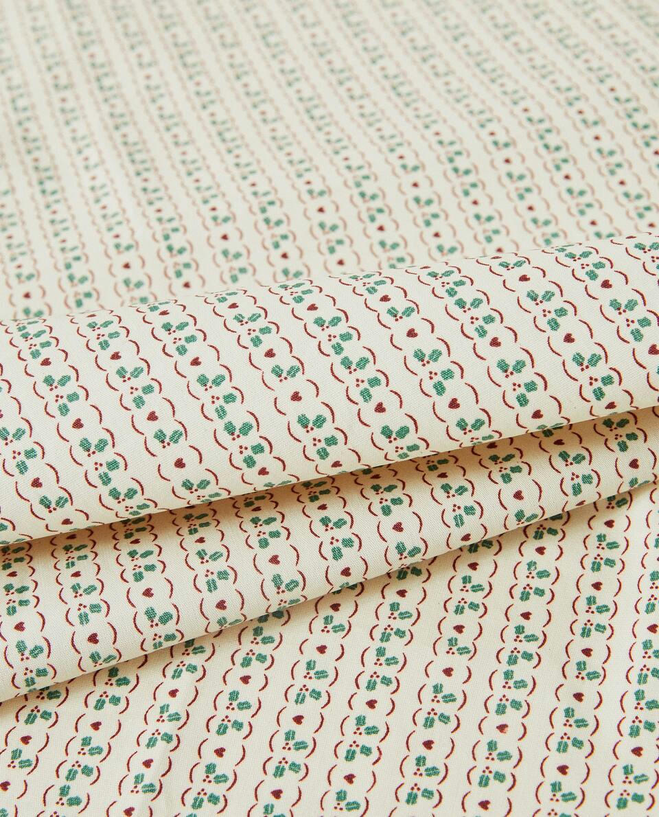 CHILDREN’S RESIN-COATED CHRISTMAS TABLECLOTH