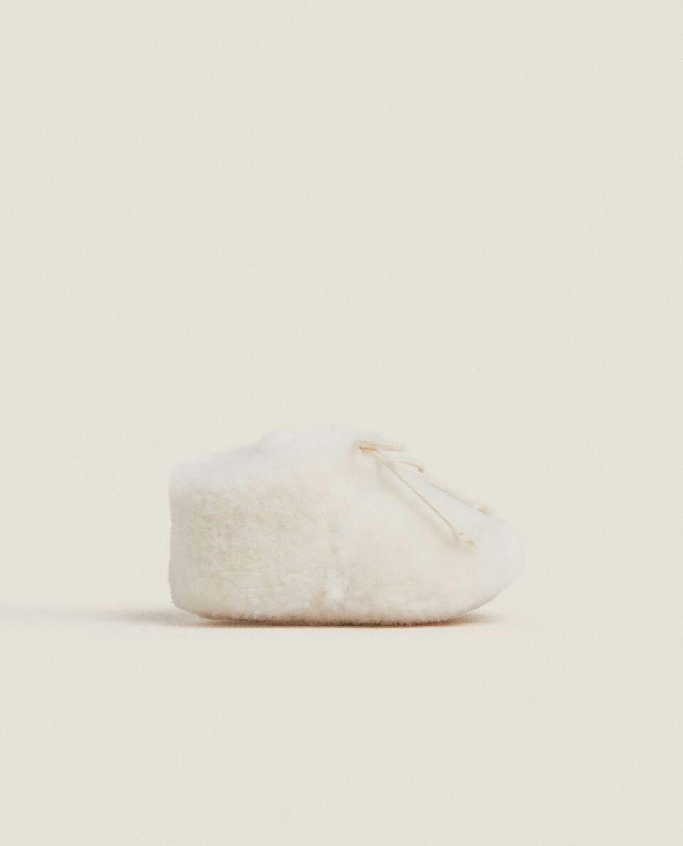 FAUX FUR BOOTIES WITH DRAWSTRING